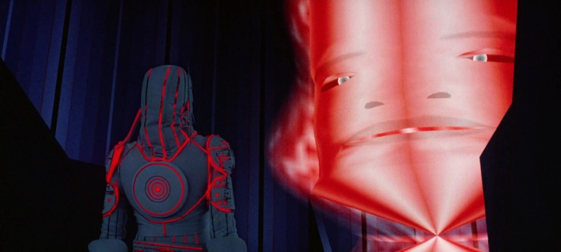 Frame dal film "Tron" (1982), Walt Disney Productions. 
Utilizzata a scopo di critica e commento educativo secondo i principi di fair use.